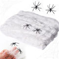 Pajęczyna biała sztuczna dekoracja na Halloween 60g + dwa pająki