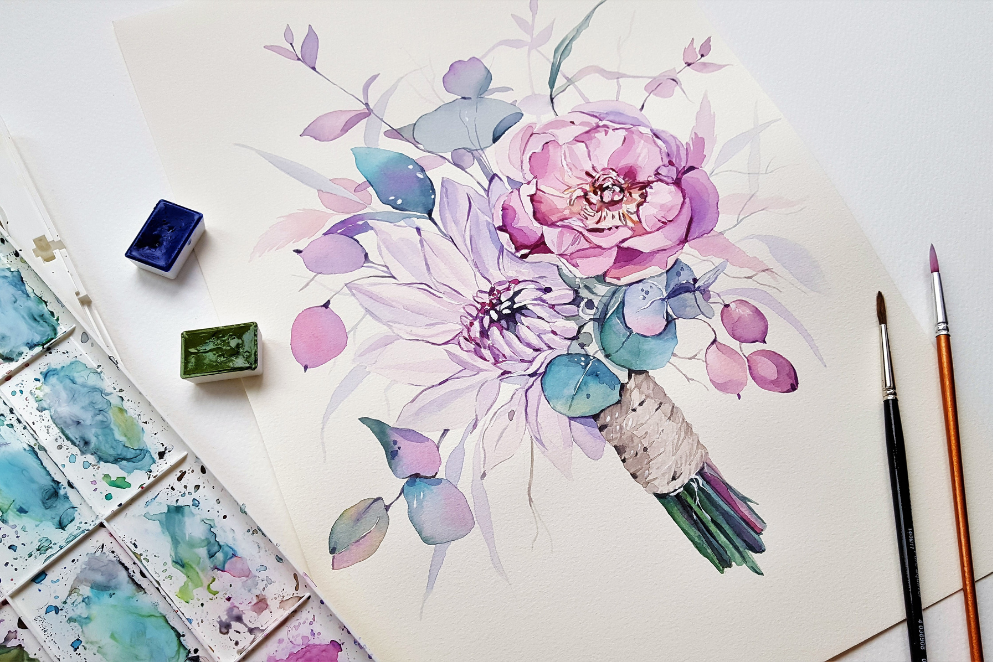 Namalowane na płótnie kwiaty a także leżące obok pędzle i farby